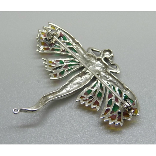 939 - A silver plique a jour and emerald set Art Deco lady brooch