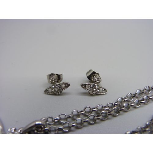 942 - A Vivienne Westwood orb pendant and chain with matching earrings