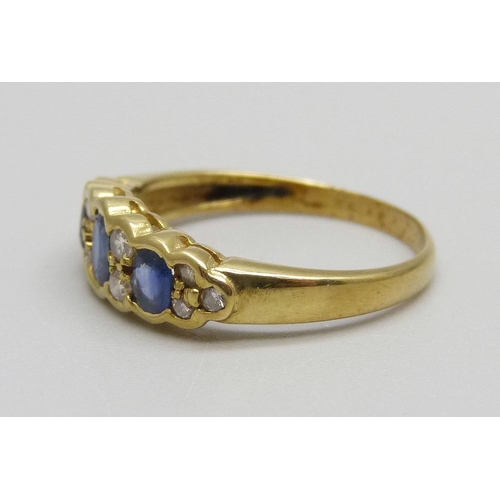 950 - A Victorian style 18ct gold, sapphire and diamond ring, 2.6g, M