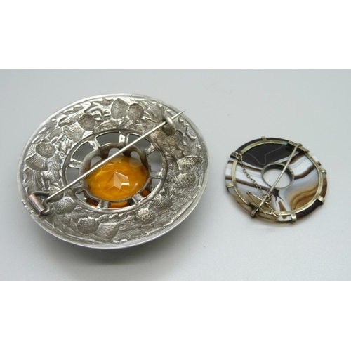 951 - A large Scottish brooch and an agate brooch