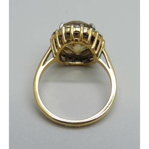 959 - A silver gilt, large andalucite and blue stone ring, P