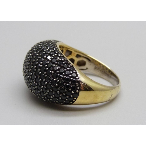 965 - A silver gilt, black spinel pave set ring, Q