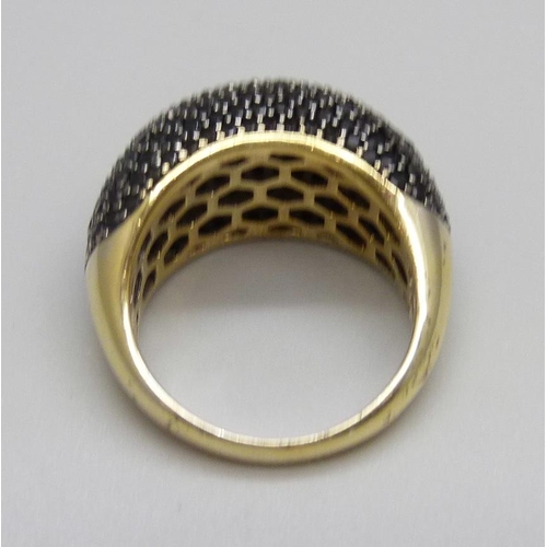 965 - A silver gilt, black spinel pave set ring, Q