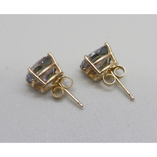 970 - A pair of 14k gold and mystic topaz ear studs, 2g