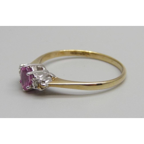 973 - A 9ct gold, ruby and diamond ring, 1.6g, P