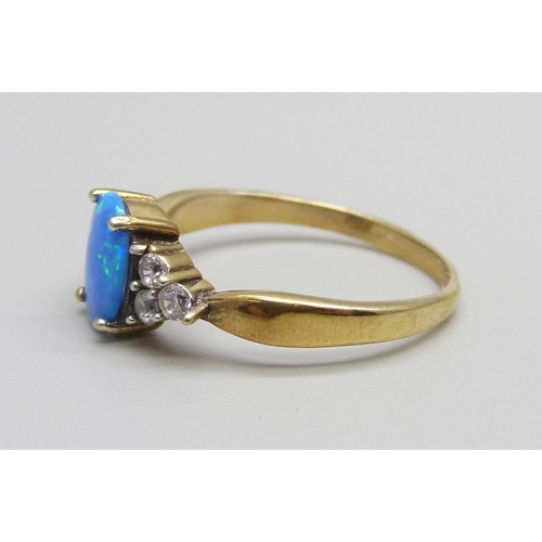 975 - A silver gilt synthetic opal and zircon ring, U