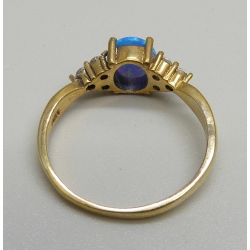 975 - A silver gilt synthetic opal and zircon ring, U