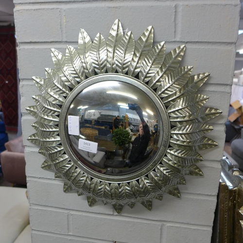 1413 - A silver convex mirror