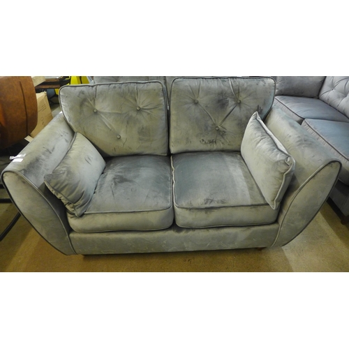 1414A - A pair of Hoxton ash velvet two seater sofas and footstool