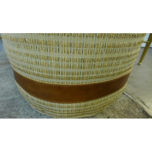 1336 - A woven rattan round pouffe with leather trim  * This lot is subject to VAT