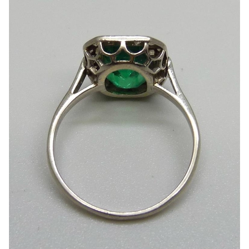 1001 - A white metal set Art Deco diamond and green stone ring, green stone a/f (large chip on one corner a... 