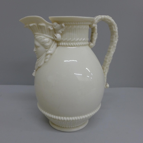 610 - A Royal Worcester face mask jug, 21cm