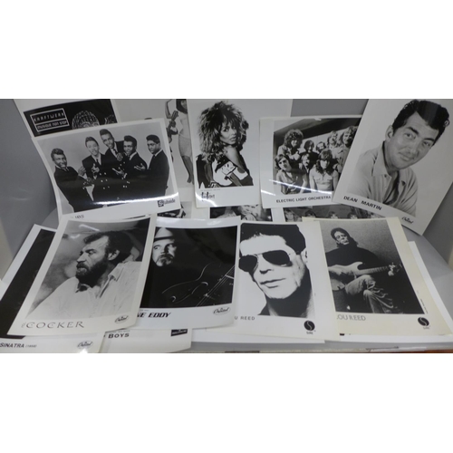 619 - Pop music original promotional photographs including Iron Maiden, Tina Turner, Hollies, etc. (17)