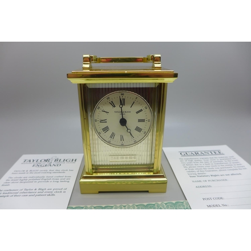 645 - An English made solid brass carriage clock with silver mask by Taylor & Bligh, London, boxed, (limit... 