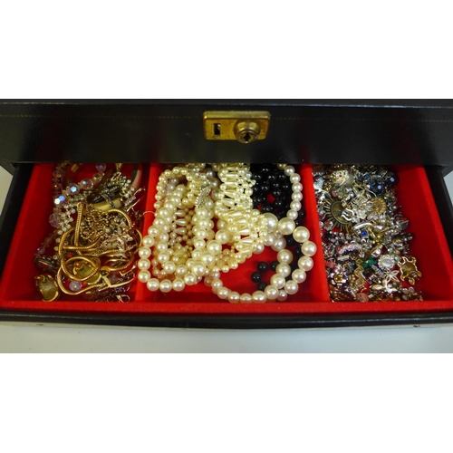 690 - A jewellery box and costume jewellery including silver