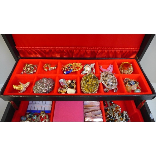 690 - A jewellery box and costume jewellery including silver