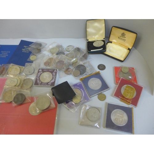 707 - A collection of coins including a US proof set, 1968, Churchill crowns, etc.