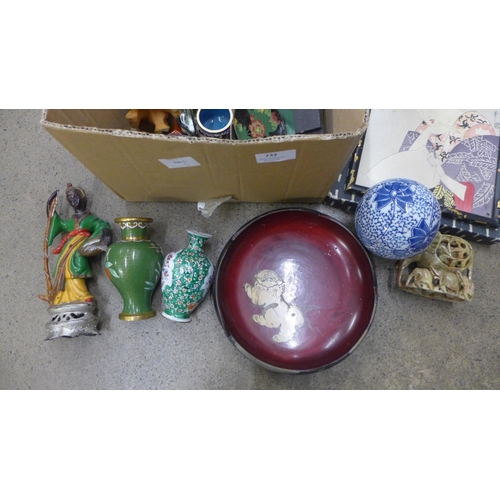 732 - A box of mixed oriental items; cloisonne vases, soapstone carving, prints, etc.