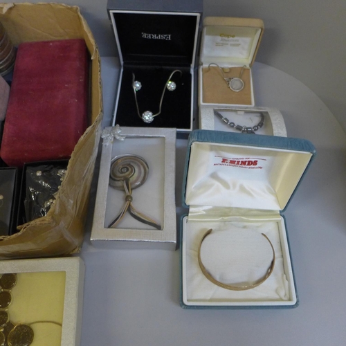 734 - Costume jewellery and a box of earrings