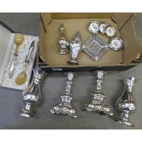 738 - A collection of silver plate items including candlesticks, sugar sifters, a set of wine coasters, ce... 