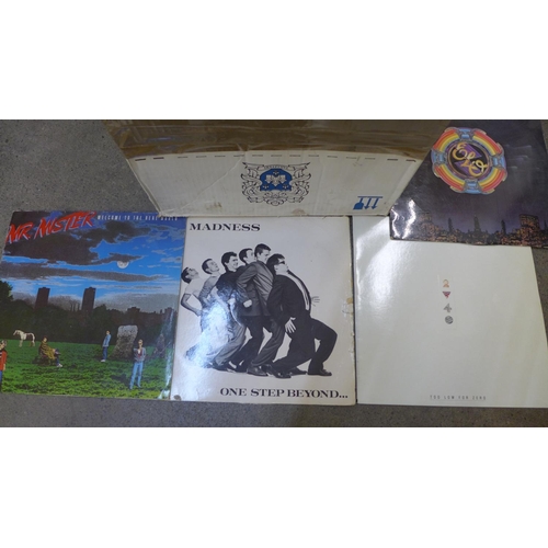 749 - A collection of over 50 LP records from 1970s and 1980s including Madness, The Police, Tom Petty, Wi... 