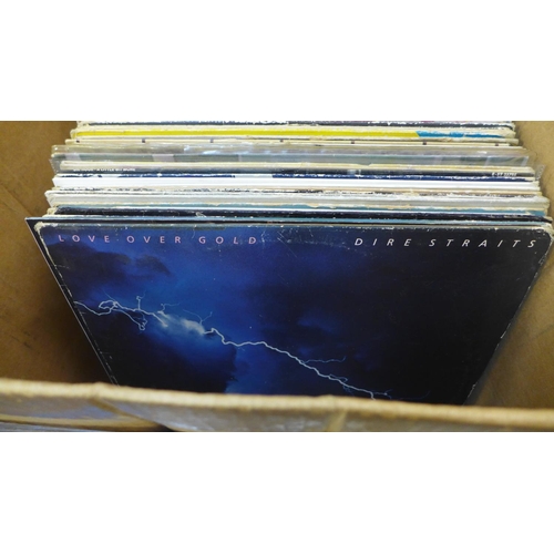 749 - A collection of over 50 LP records from 1970s and 1980s including Madness, The Police, Tom Petty, Wi... 