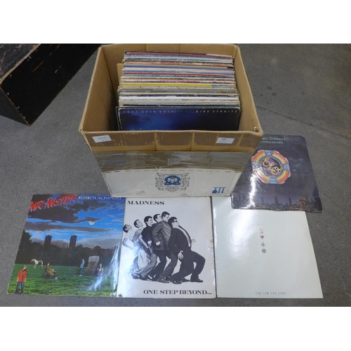 749 - A collection of over 50 LP records from 1970s and 1980s including Madness, The Police, Tom Petty, Wi... 