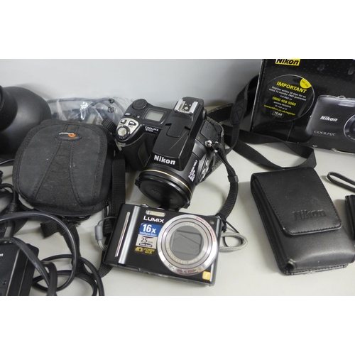 784 - A collection of cameras and equipment including Nikon Coolpix S700, Nikon Coolpix S3100 and a Panaso... 