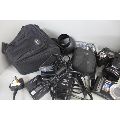 784 - A collection of cameras and equipment including Nikon Coolpix S700, Nikon Coolpix S3100 and a Panaso... 