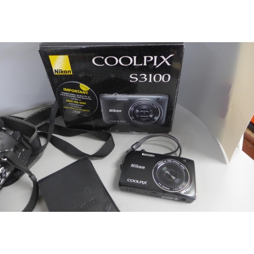 784 - A collection of cameras and equipment including Nikon Coolpix S700, Nikon Coolpix S3100 and a Panaso... 