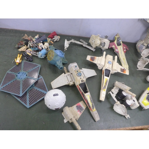 788 - A collection of Kenner Star Wars model space crafts, and figures dating from 1980s onwards