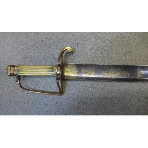 819 - A George III Officer's sword, possibly Naval, ivory grip, brass guard, etched curved blade, with bra... 