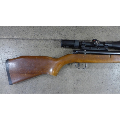 824B - A Webley & Scott Osprey .22 side lever air rifle with Simmons 3-9x40 Prosport zoom scope