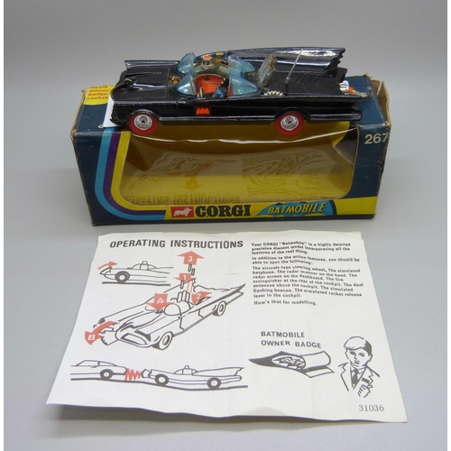 840 - A 267 Corgi Batmobile, rocket firing with red tyres and box