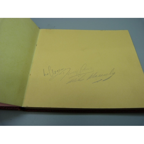 842 - An autograph book containing signatures, 1960's England cricketers, Dexter, Bedser, Statham, etc.