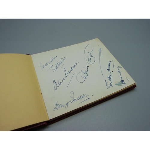 842 - An autograph book containing signatures, 1960's England cricketers, Dexter, Bedser, Statham, etc.