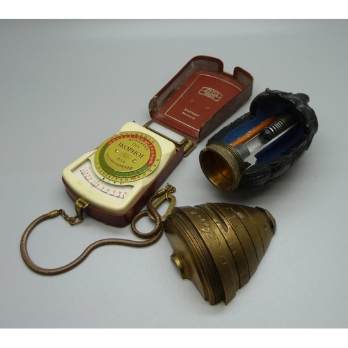 859 - Two demonstrator cut-away models of a hand grenade and bomb fuse plus a Zeiss Ikon light meter