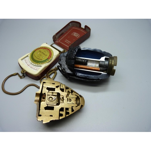 859 - Two demonstrator cut-away models of a hand grenade and bomb fuse plus a Zeiss Ikon light meter