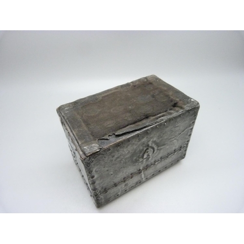 875 - An Arts and Crafts metal covered playing card box, containing two packs of playing cards