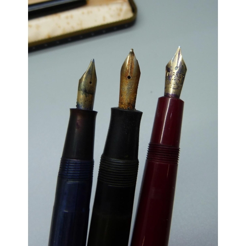 892 - A Parker 61 fountain pen, boxed, and three other pens, including Waterman's 503 and Parker Junior wi... 