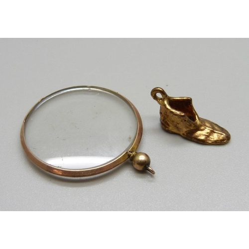 930 - A 9ct gold photograph pendant and boot charm