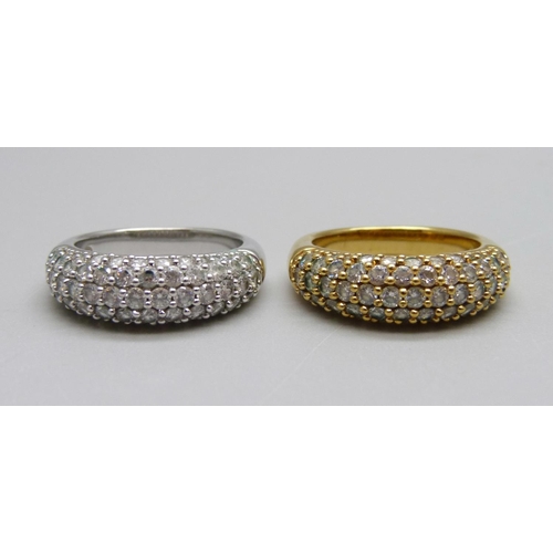 932 - A Swarovski white rhodium plated crystal pave band and a Swarovski gold tone plated crystal pave ban... 