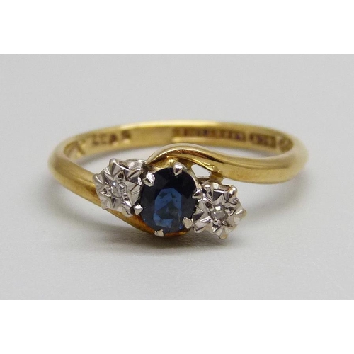 944 - An 18ct yellow gold, diamond and sapphire ring, 2.7g, L