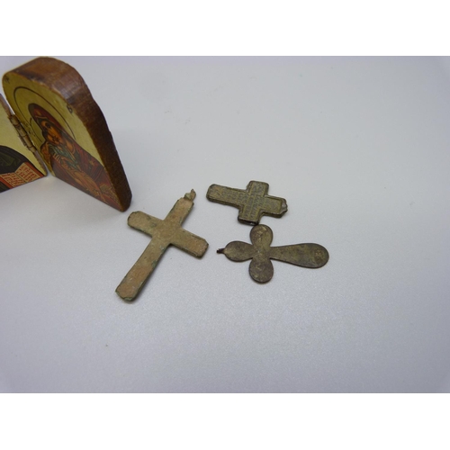 954 - A Russian icon and three Russian crosses