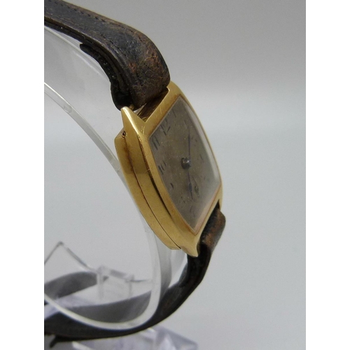 967 - A 9ct gold cased wristwatch, mark worn, case back dented, 24mm case