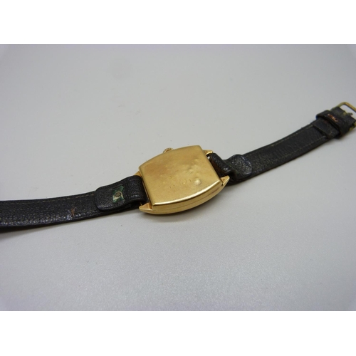 967 - A 9ct gold cased wristwatch, mark worn, case back dented, 24mm case