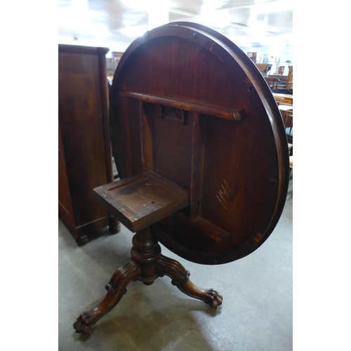 109 - A George IV rosewood circular tilt top centre table