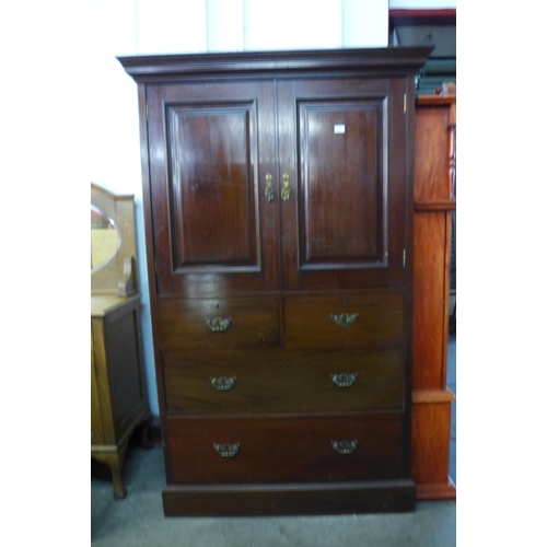 148 - A Victorian mahogany bachelors wardrobe