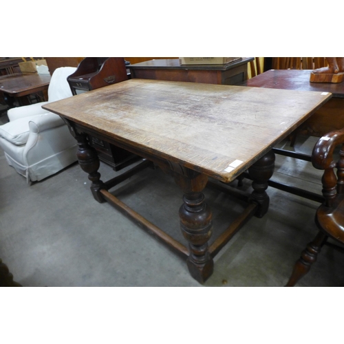 158 - A 17th Century style oak refectory table