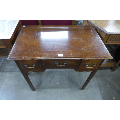 184 - A George III oak lowboy